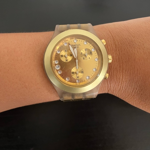 Swatch Accessories - Swatch gold watch